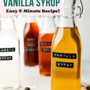 Vanilla syrup in a glass bottle next to other syrups.