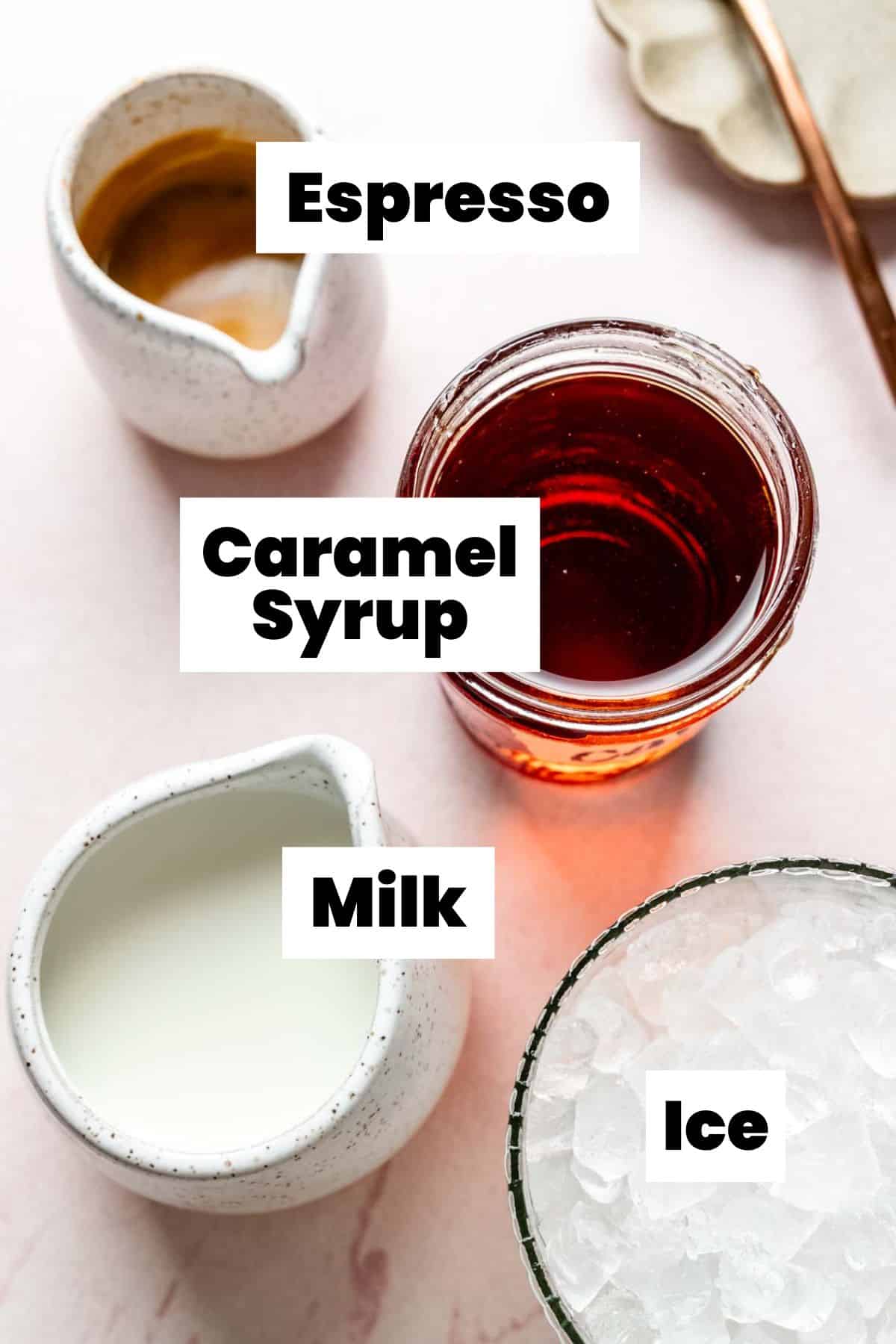Ingredients for a caramel latte measured out in bowls.